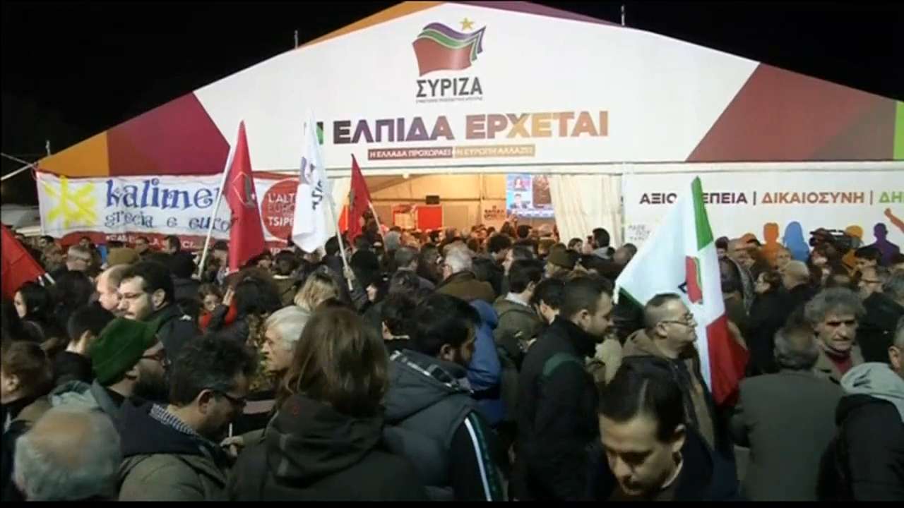 Business Report: Greece elects anti-austerity party, Apple results expected